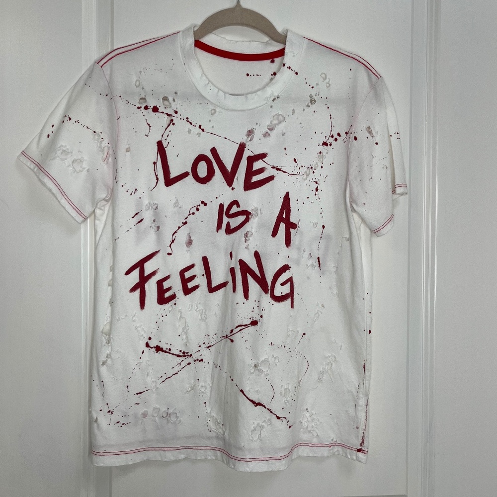 Distressed Graphic Tee “Love is a Feeling / Not a Decision” XS